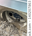 Tires stuck in the mud 140207863