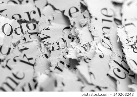 Scraps of paper with words and letters from magazines and newspapers. Newspaper paper strips background. Scraps of paper with words and letters from magazines and newspapers. Newspaper paper strips background. 140208248