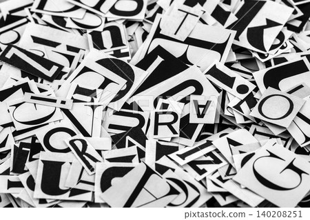 Pile of many black and white letters from newspapers and magazines. Typography background composition. Pile of many black and white letters from newspapers and magazines. Typography background composition. 140208251