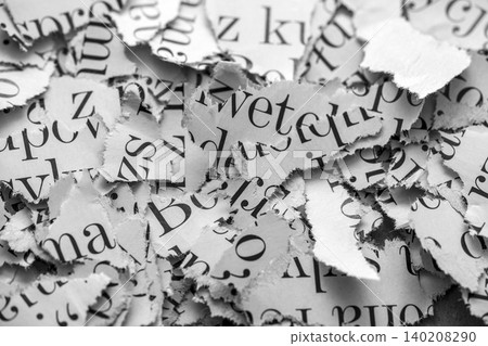 Scraps of paper with words and letters from magazines and newspapers. Newspaper paper strips background. Scraps of paper with words and letters from magazines and newspapers. Newspaper paper strips background. 140208290