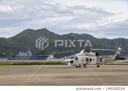 Destroyer Hyuga and anti-submarine patrol helicopter Destroyer Hyuga and anti-submarine patrol helicopter 140208584