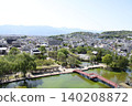 The castle town and the Northern Alps as seen from Matsumoto Castle's keep. 140208872