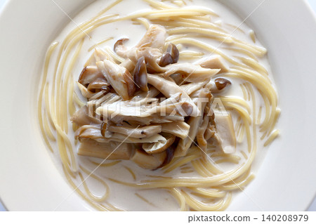 Mushroom cream soup pasta viewed from directly above. Mushroom cream soup pasta viewed from directly above. 140208979