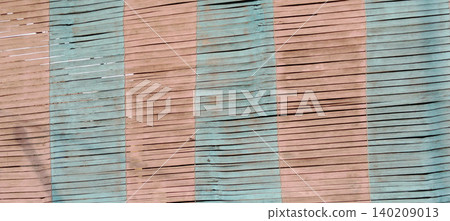 Colorful woven bamboo mat texture background with traditional handicraft pattern. Colorful woven bamboo mat texture background with traditional handicraft pattern. 140209013