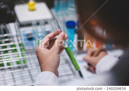 Researchers working in the clinical laboratory Researchers working in the clinical laboratory 140209656