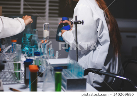 Researchers working in the clinical laboratory 140209690