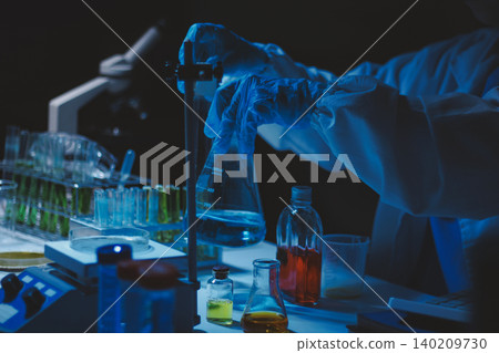 Researchers working in the clinical laboratory Researchers working in the clinical laboratory 140209730