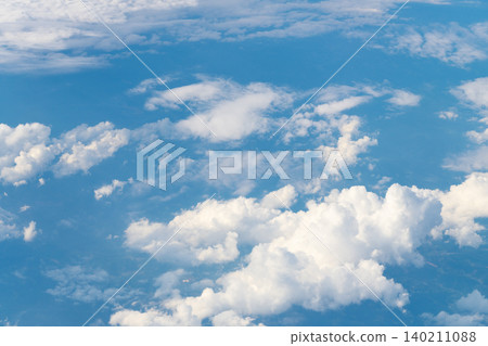 Clouds at the sky. Cloudscape - Blue sky and white clouds. Beautiful blue sky background with clouds. White fluffy clouds in the blue sky. Blue sky and white clouds of daytime Clouds at the sky. Cloudscape - Blue sky and white clouds. Beautiful blue sky background with clouds. White fluffy clouds in the blue sky. Blue sky and white clouds of daytime 140211088