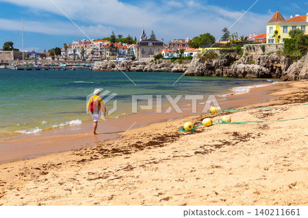 Sandy Beach and Coastal Architecture in Cascais Portugal Summer Sandy Beach and Coastal Architecture in Cascais Portugal Summer 140211661