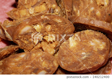 Close up of chorizo sliced cooking frying food preparation for meal Close up of chorizo sliced cooking frying food preparation for meal 140212400