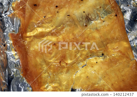 Close up or roasted chicken skin golden fat glazed Close up or roasted chicken skin golden fat glazed 140212437