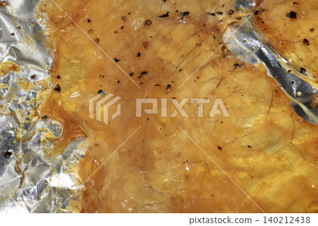 Close up or roasted chicken skin golden fat glazed Close up or roasted chicken skin golden fat glazed 140212438