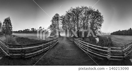 Wooden Bridge Across Wetlands in Morning Fog Wooden Bridge Across Wetlands in Morning Fog 140213090