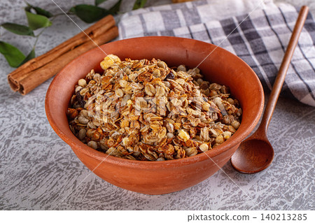 Dry Muesli granola snack with cereal nuts and berries Dry Muesli granola snack with cereal nuts and berries 140213285