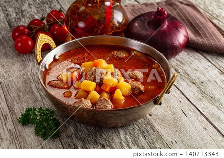 Tomato soup with meatballs and vegetables Tomato soup with meatballs and vegetables 140213343