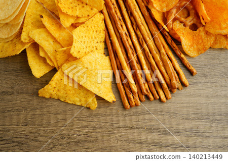 Mix of variety snack chips pretzel and cracker, junk crunchy food. Mix of variety snack chips pretzel and cracker, junk crunchy food. 140213449