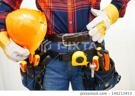 Male builder worker with tool belt pocket at waist. 140213453