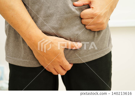 Hernia, Asian man stomach ache, abdominal pain and urology problem health. Hernia, Asian man stomach ache, abdominal pain and urology problem health. 140213616