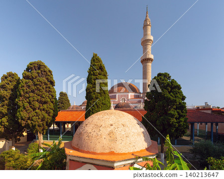 Mosque with minaret and domes among trees in old town of Rhodes Greece Mosque with minaret and domes among trees in old town of Rhodes Greece 140213647