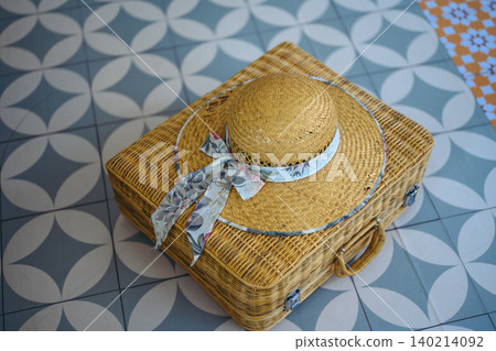 Suitcase and Straw Hat Suitcase and Straw Hat 140214092