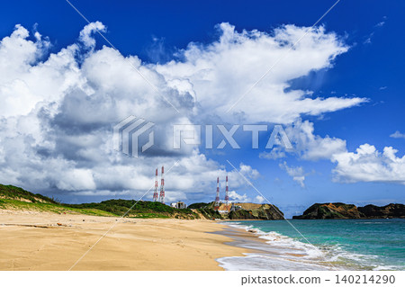 A beautiful surf beach on Tanegashima Island with a distant view of the rocket launch pad. A beautiful surf beach on Tanegashima Island with a distant view of the rocket launch pad. 140214290