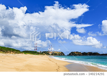 Summer clouds spread across the landscape of Tanegashima Island, including the surf spot below the lighthouse and the island known as "Rocket Island." Summer clouds spread across the landscape of Tanegashima Island, including the surf spot below the lighthouse and the island known as "Rocket Island." 140214291