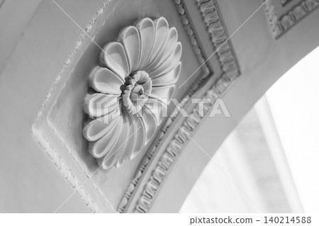 Close-up monochrome photograph of a decorative plaster Close-up monochrome photograph of a decorative plaster 140214588