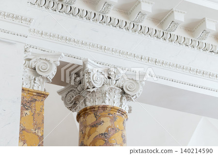 Ornate Corinthian column with carved acanthus capital Ornate Corinthian column with carved acanthus capital 140214590