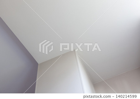 Minimal interior corner showing a smooth ceiling and walls Minimal interior corner showing a smooth ceiling and walls 140214599