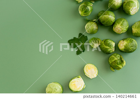 organic green brussels sprouts on green background organic green brussels sprouts on green background 140214661