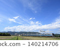 The Odakyu Line runs under a blue sky. 140214706