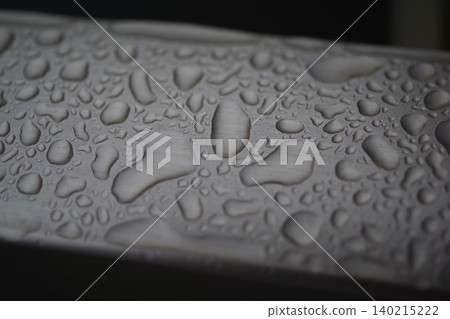 Raindrops on the railing (top left to bottom right) Raindrops on the railing (top left to bottom right) 140215222