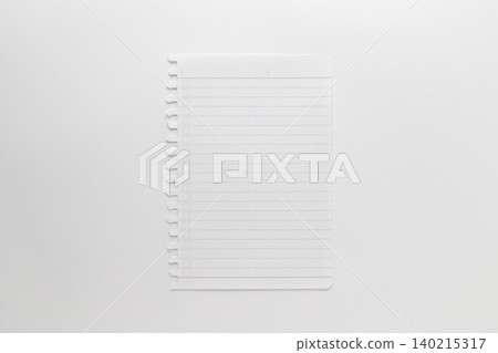 A photograph of a notepad page taken from directly above against a white background. A photograph of a notepad page taken from directly above against a white background. 140215317