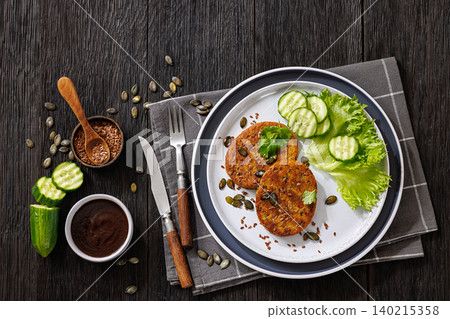 Plant Based Burger Patties With Green Salad Plant Based Burger Patties With Green Salad 140215358