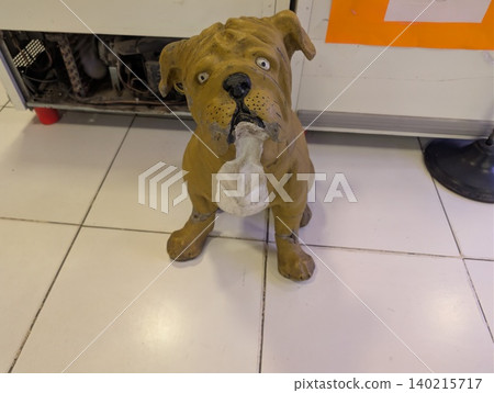 Perito Moreno Glacier, Patagonia, Argentina - March 10, 2026: Bulldog statue decorating a tourist cafe Perito Moreno Glacier, Patagonia, Argentina - March 10, 2026: Bulldog statue decorating a tourist cafe 140215717
