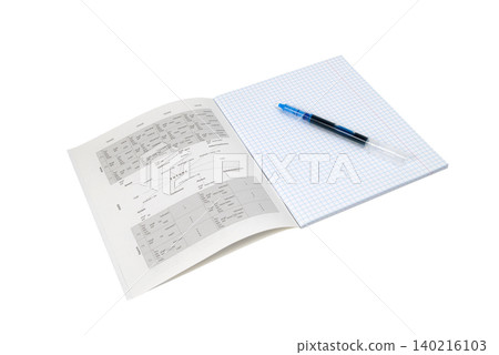 open squared notebook with a blue pen at an angle, english grammar on spread open squared notebook with a blue pen at an angle, english grammar on spread 140216103
