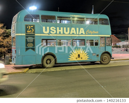El Calafate, Patagonia, Argentina - March 8, 2026: Side view of a decorative Ushuaia tourist bus El Calafate, Patagonia, Argentina - March 8, 2026: Side view of a decorative Ushuaia tourist bus 140216133