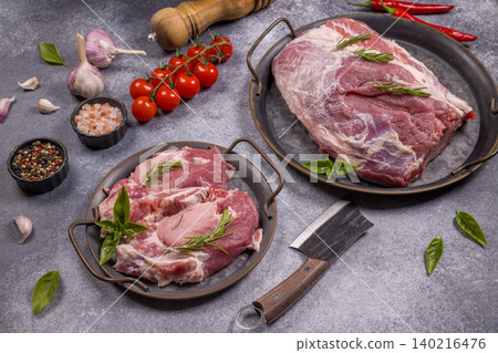 Raw pork meat preparing for cooking with ingredients Raw pork meat preparing for cooking with ingredients 140216476