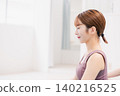 A young woman doing yoga at a yoga studio 140216525