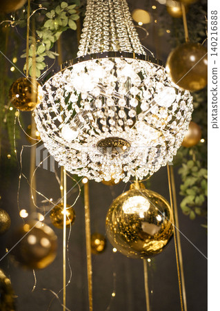 Luxurious Holiday Scene with Golden Baubles and Warm Festive Lighting Luxurious Holiday Scene with Golden Baubles and Warm Festive Lighting 140216888