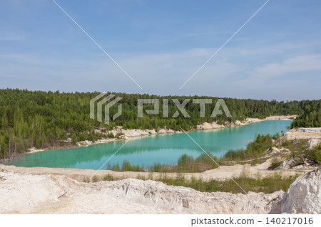 Turquoise lake and white sand quarry landscape in Ural Bali, Russia Turquoise lake and white sand quarry landscape in Ural Bali, Russia 140217016