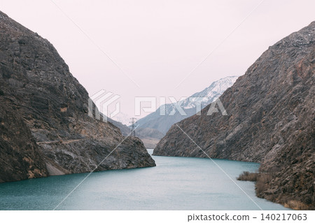 Turquoise river through Naryn Canyon gorge with rugged mountains, Kyrgyzstan Turquoise river through Naryn Canyon gorge with rugged mountains, Kyrgyzstan 140217063