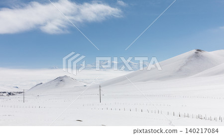 Winter panorama of Alay Valley with snowy hills and distant mountains, Kyrgyzstan Winter panorama of Alay Valley with snowy hills and distant mountains, Kyrgyzstan 140217084