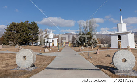 Ruh Ordo cultural complex walkway with chapels and mountains in Cholpon-Ata Ruh Ordo cultural complex walkway with chapels and mountains in Cholpon-Ata 140217185