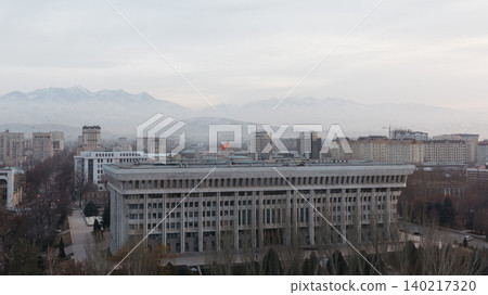 White House government building in Bishkek city skyline with mountains at dusk White House government building in Bishkek city skyline with mountains at dusk 140217320