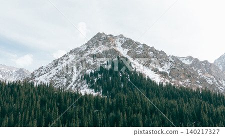 Snowy mountain and evergreen forest landscape in Ala-Archa National Park, Bishkek 140217327