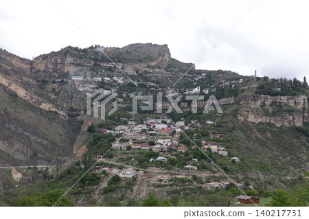 Mountain village panorama of Gunib aul on rocky plateau in the Caucasus Mountain village panorama of Gunib aul on rocky plateau in the Caucasus 140217731