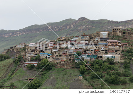Panoramic view of Chokh mountain village on green slopes in Dagestan 140217737