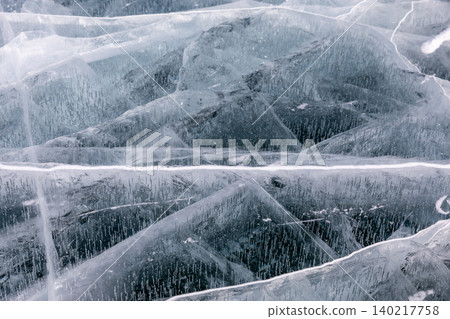 Winter ice texture with cracks and trapped bubbles on Lake Baikal surface, Russia Winter ice texture with cracks and trapped bubbles on Lake Baikal surface, Russia 140217758