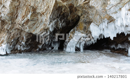 Winter ice cave and frozen grotto on Kharantsy Island, Lake Baikal coast Winter ice cave and frozen grotto on Kharantsy Island, Lake Baikal coast 140217801